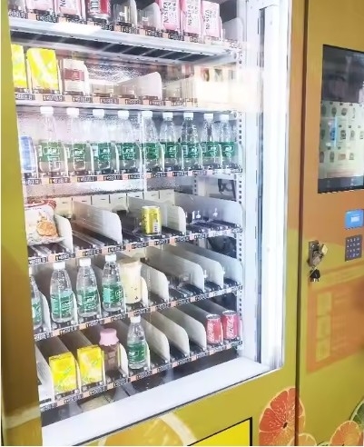 Patented Isolation Door And Digital List In Automatic Vending Machine For Durability And Convenience